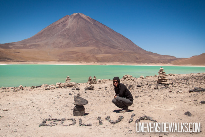 Alyssa Spelling out Bolivia with Rocks by Laguna Verde